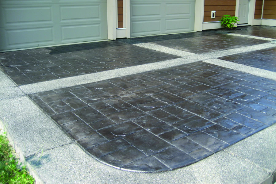 Niko Projects stamped concrete with exposed aggregate bands